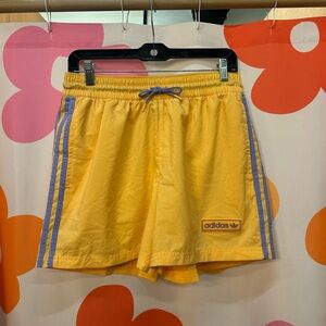 Adidas Orange Shorts with Purple Stripes